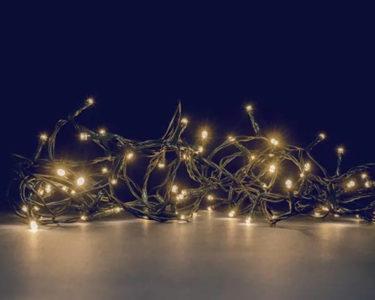 Guirlande lumineuse animée à 104 LED blanc chaud + 24 LED flash sur câble vert Flicker Light® - 8 m